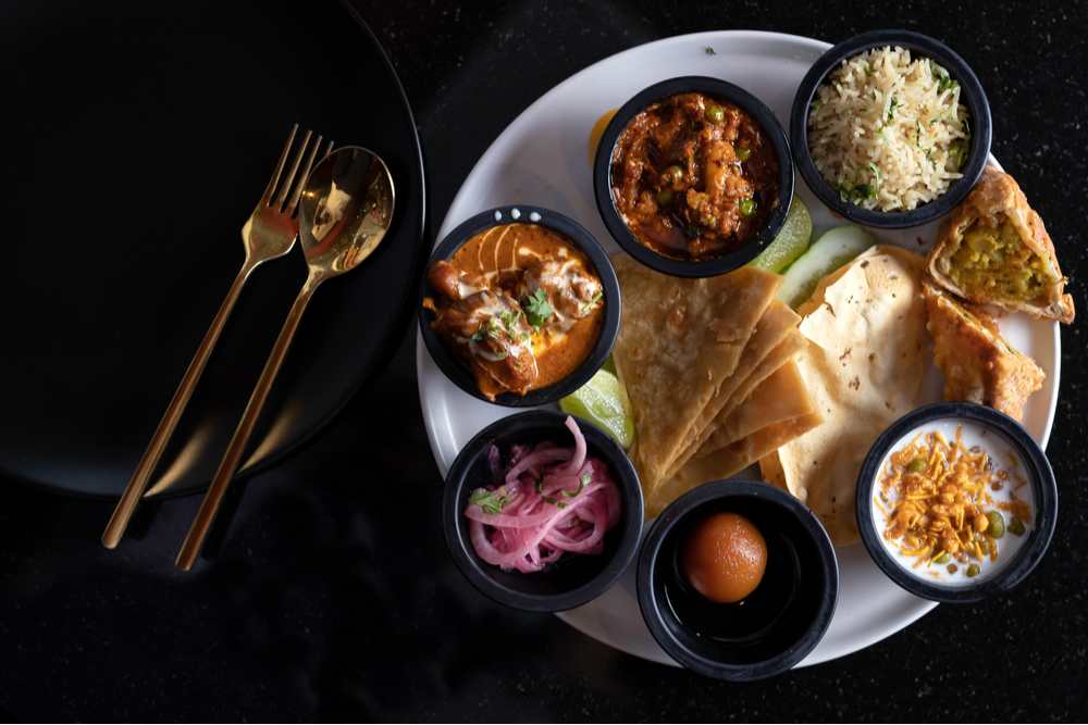 Traditional South Asian thali with balanced macros — metabolic meal planning for desi cuisine